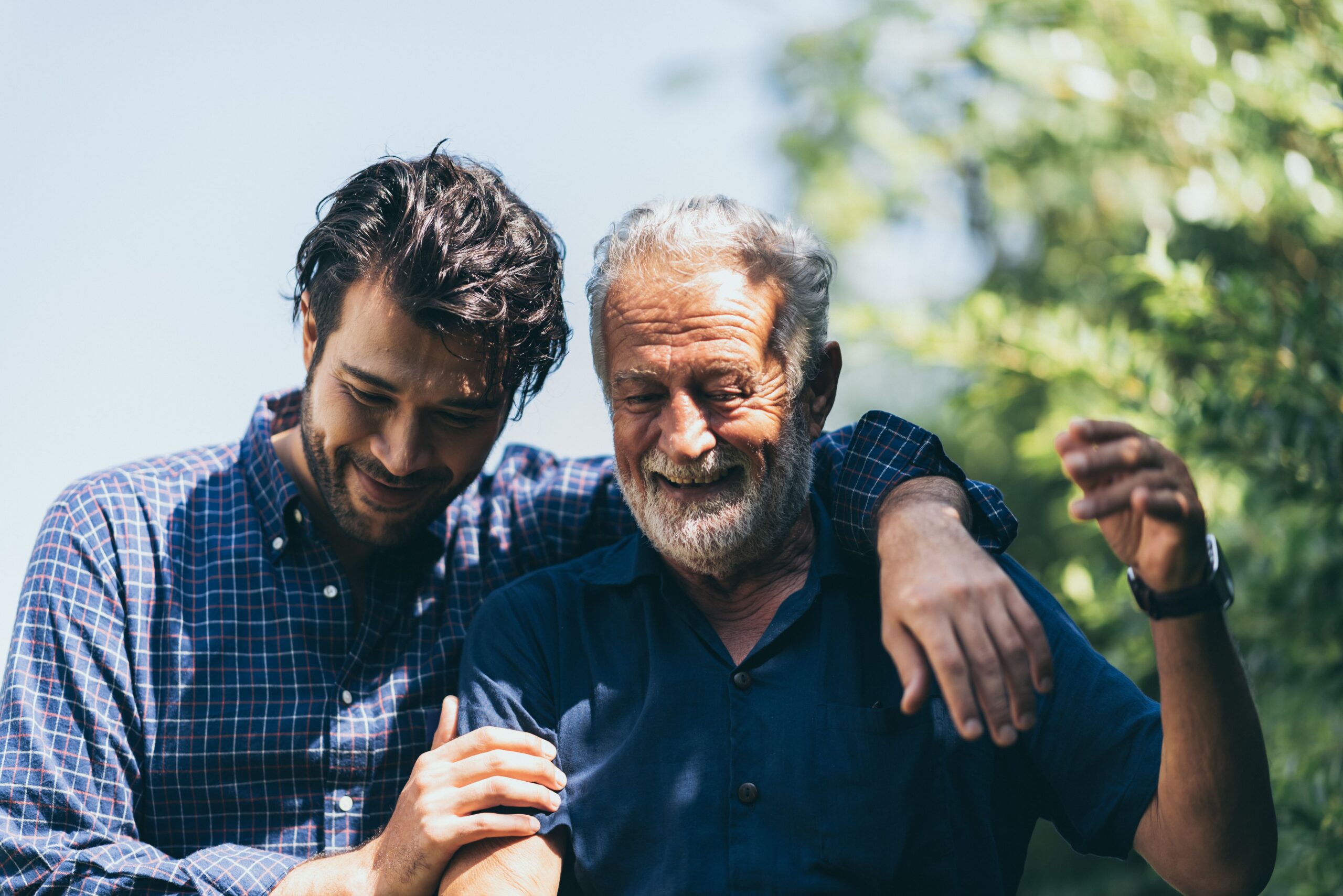 A man helping his alcoholic father.