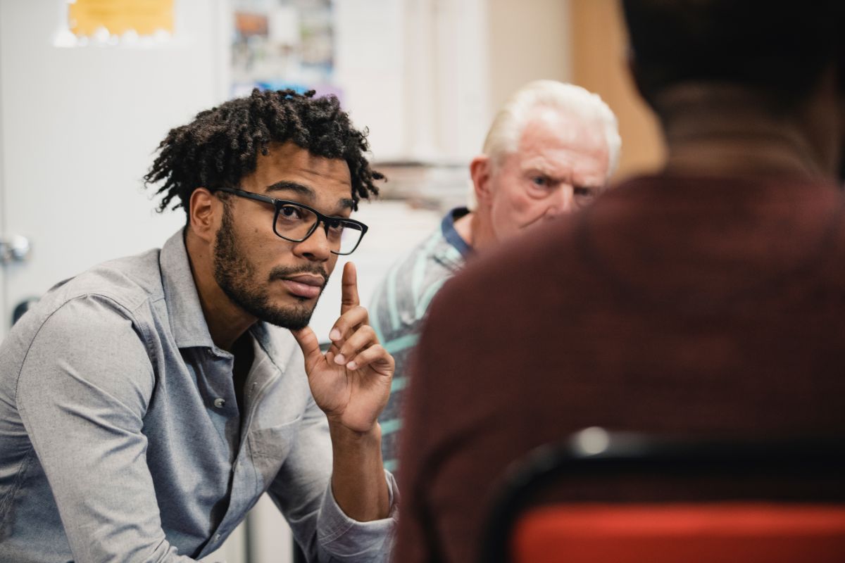 men in a support group during outpatient rehab in Atlanta