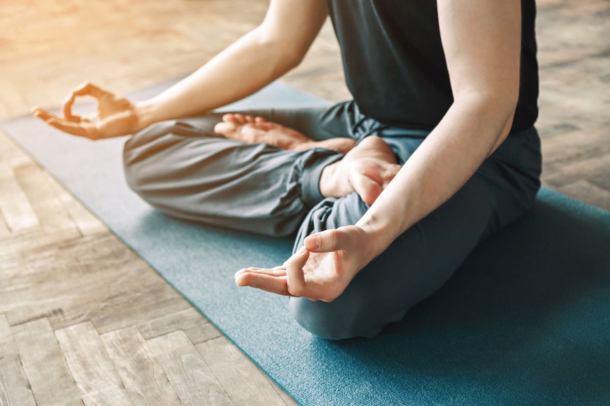 man in yoga during holistic therapy in Georgia