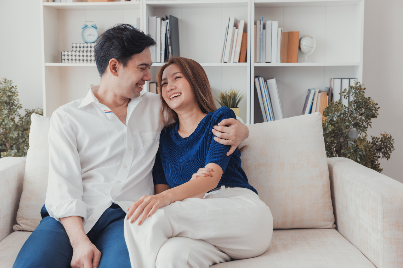 husband and wife embracing each other after husband received treatment for addiction